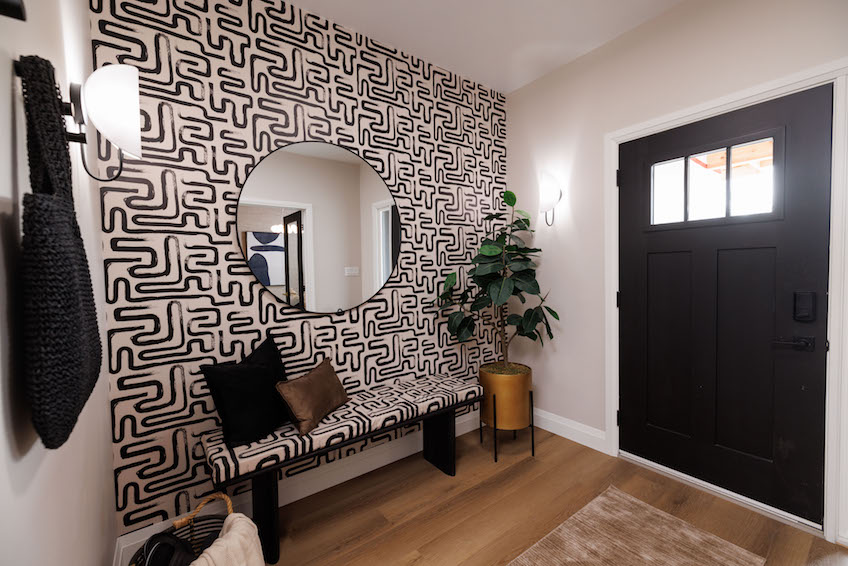 Entryway with geographic wallpaper designs